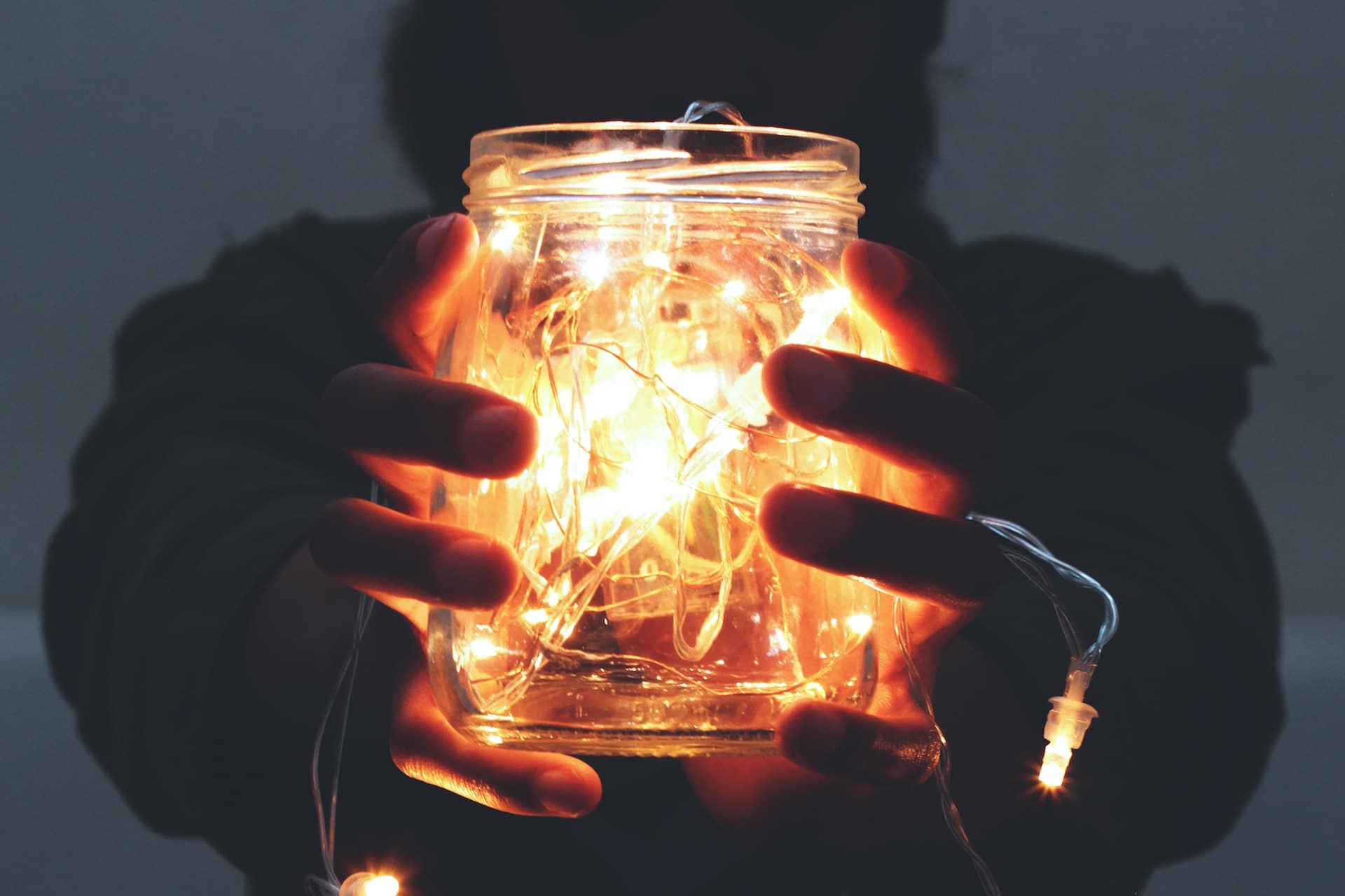 Glass jar full of little light bulbs